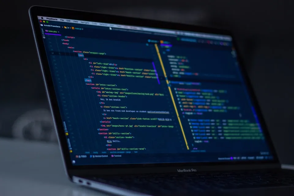Code on a developer screen representing web and app development by BlueTie